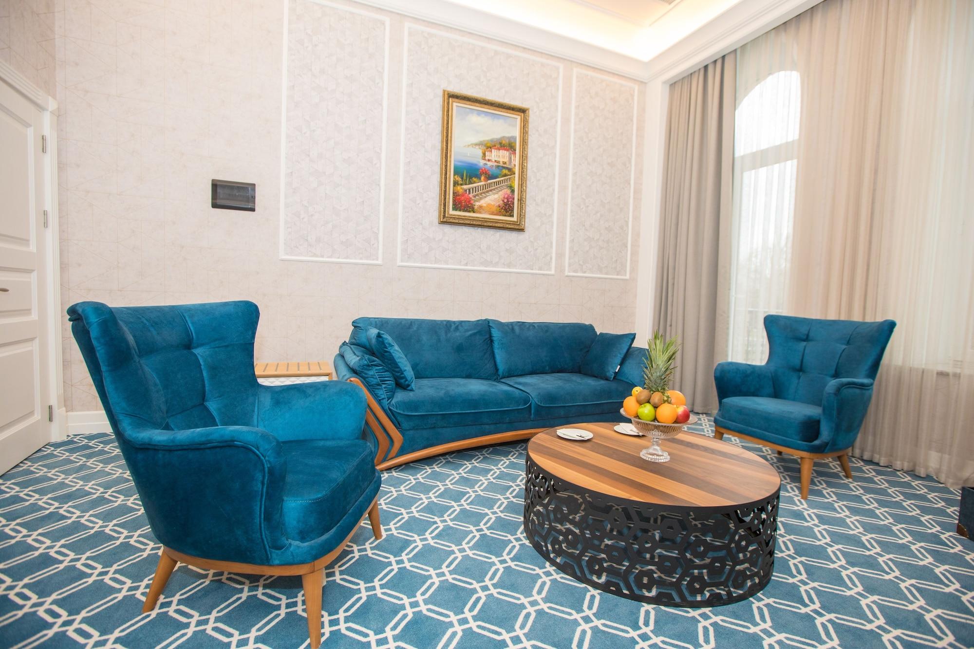 Promenade Hotel Баку Екстер'єр фото A living room in a hotel